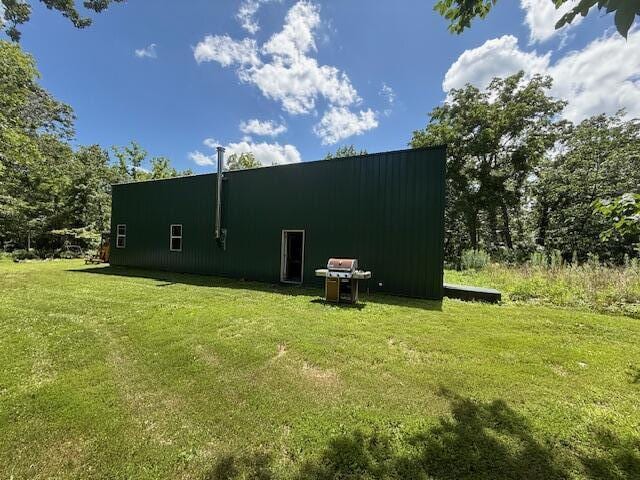 890 Bluebird Ln, Sparta, MO 65753 - view of property exterior featuring a lawn and an outbuilding