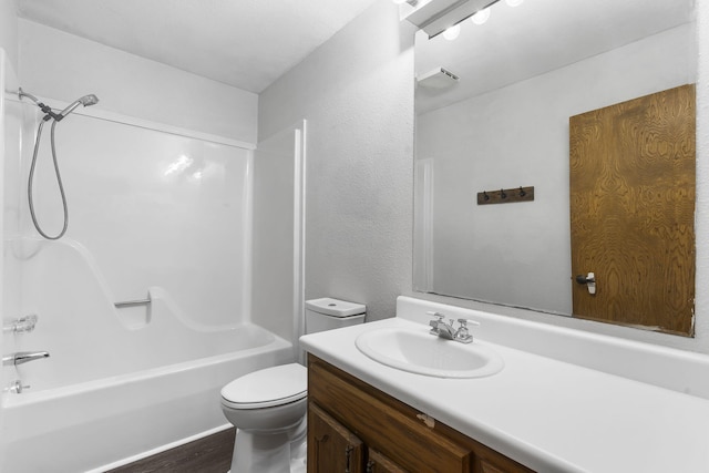 167 Eagle Valley Ct, Hollister, MO 65672 - full bathroom with vanity, tub / shower combination, and wood finished floors
