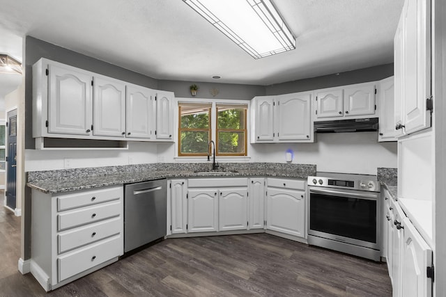 167 Eagle Valley Ct, Hollister, MO 65672 - kitchen featuring appliances with stainless steel finishes, under cabinet range hood, white cabinetry, and dark wood-style floors