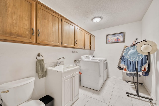 29 Trail Ridge Dr, Kimberling City, MO 65686 - laundry area featuring separate washer and dryer and a textured ceiling