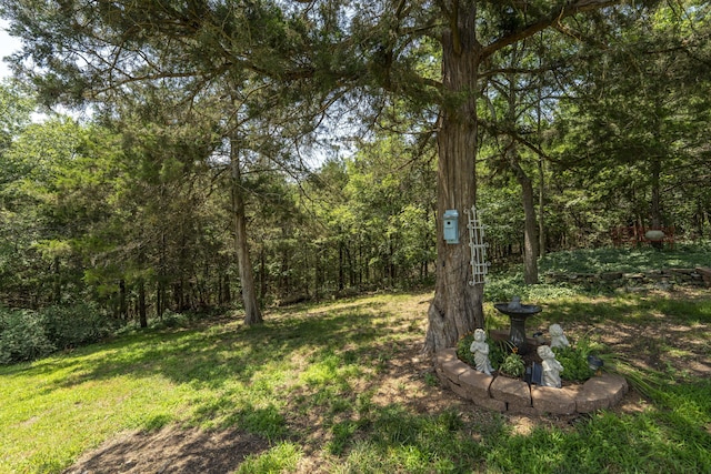 29 Trail Ridge Dr, Kimberling City, MO 65686 - view of grassy yard with a wooded view
