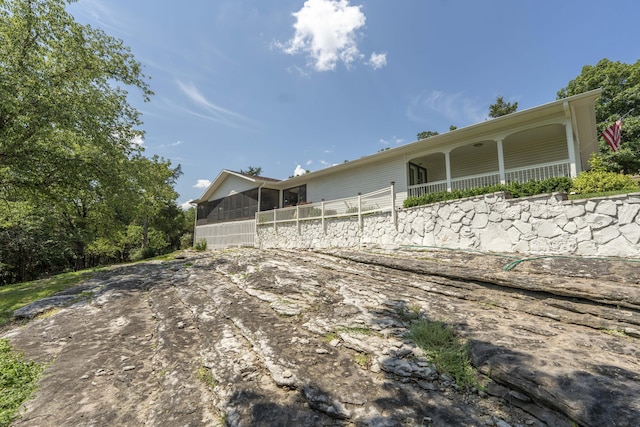 29 Trail Ridge Dr, Kimberling City, MO 65686 - back of property with a sunroom