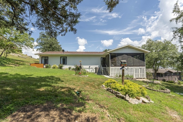 29 Trail Ridge Dr, Kimberling City, MO 65686 - rear view of property featuring a sunroom and a lawn