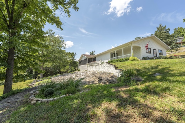 29 Trail Ridge Dr, Kimberling City, MO 65686 - view of home's exterior with a lawn