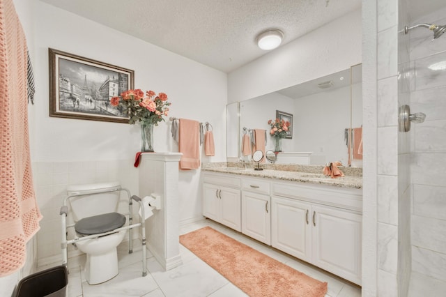 29 Trail Ridge Dr, Kimberling City, MO 65686 - full bath featuring double vanity, a shower, and a textured ceiling