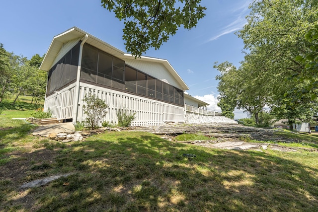 29 Trail Ridge Dr, Kimberling City, MO 65686 - view of side of property featuring a sunroom and a yard