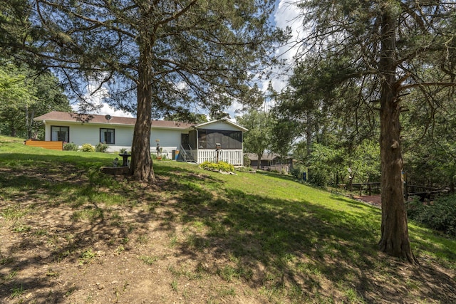 29 Trail Ridge Dr, Kimberling City, MO 65686 - view of grassy yard with a sunroom