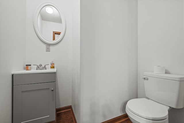 716 S Rogers Ave, Springfield, MO 65804 - half bath featuring vanity and wood finished floors