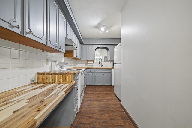 716 S Rogers Ave, Springfield, MO 65804 - kitchen with wooden counters, white appliances, gray cabinets, decorative backsplash, and arched walkways