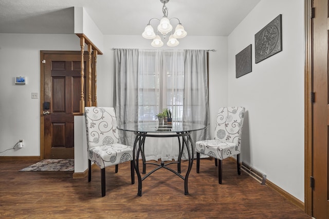 716 S Rogers Ave, Springfield, MO 65804 - dining area with a chandelier and wood finished floors