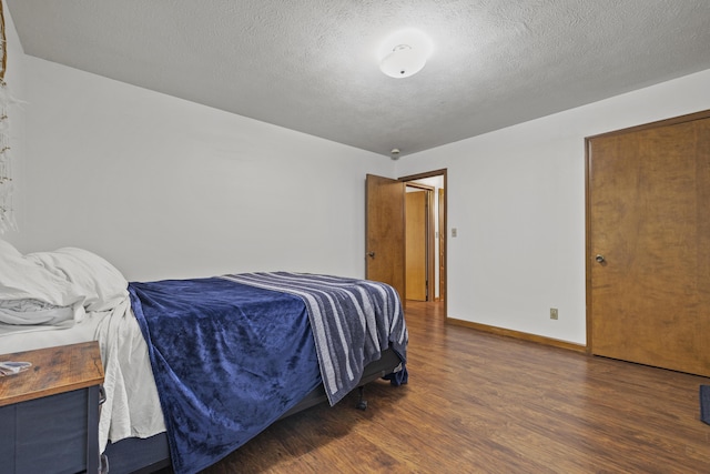 716 S Rogers Ave, Springfield, MO 65804 - bedroom featuring wood finished floors and a textured ceiling