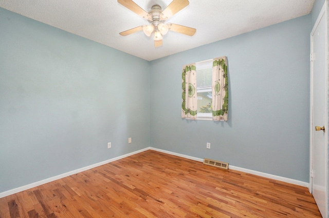 1111 S Lone Pine Ave, Springfield, MO 65804 - empty room featuring light wood-type flooring and a ceiling fan