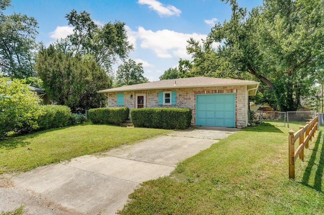 1111 S Lone Pine Ave, Springfield, MO 65804 - view of front of home featuring a garage, concrete driveway, and stone siding