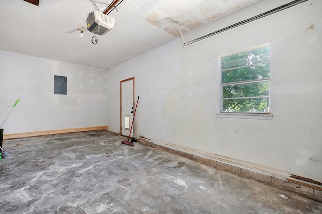 1111 S Lone Pine Ave, Springfield, MO 65804 - garage featuring electric panel and a garage door opener