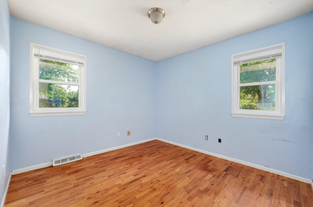 1111 S Lone Pine Ave, Springfield, MO 65804 - unfurnished room with light wood finished floors and baseboards