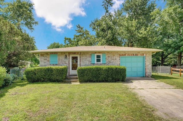 1111 S Lone Pine Ave, Springfield, MO 65804 - view of front of home featuring stone siding, concrete driveway, and an attached garage