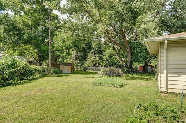 1111 S Lone Pine Ave, Springfield, MO 65804 - view of yard featuring a storage shed