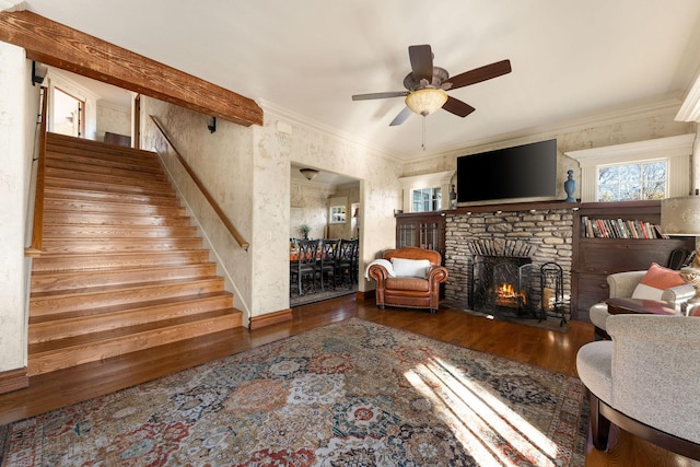120 N 4th St, Branson, MO 65616 - living room featuring a fireplace, wood finished floors, stairs, ceiling fan, and crown molding