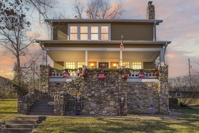 120 N 4th St, Branson, MO 65616 - view of front of home featuring stairway, covered porch, a chimney, and stone siding