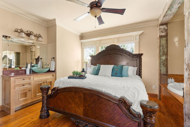 120 N 4th St, Branson, MO 65616 - bedroom featuring light wood-type flooring, crown molding, and a ceiling fan