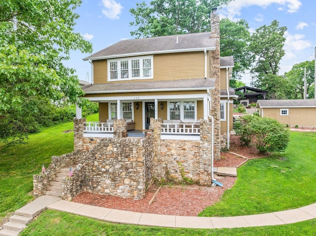 120 N 4th St, Branson, MO 65616 - view of front of home with a chimney, a front lawn, covered porch, and stairs