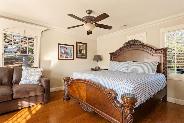 120 N 4th St, Branson, MO 65616 - bedroom with wood finished floors, ornamental molding, and ceiling fan