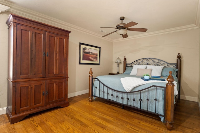 120 N 4th St, Branson, MO 65616 - bedroom featuring light wood-style floors, crown molding, and ceiling fan