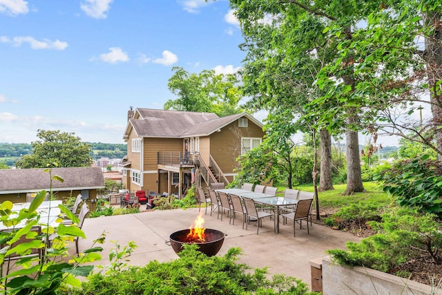 120 N 4th St, Branson, MO 65616 - view of patio / terrace featuring an outdoor fire pit and outdoor dining area