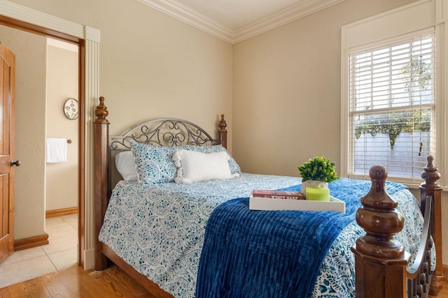 120 N 4th St, Branson, MO 65616 - bedroom with ornamental molding and wood finished floors
