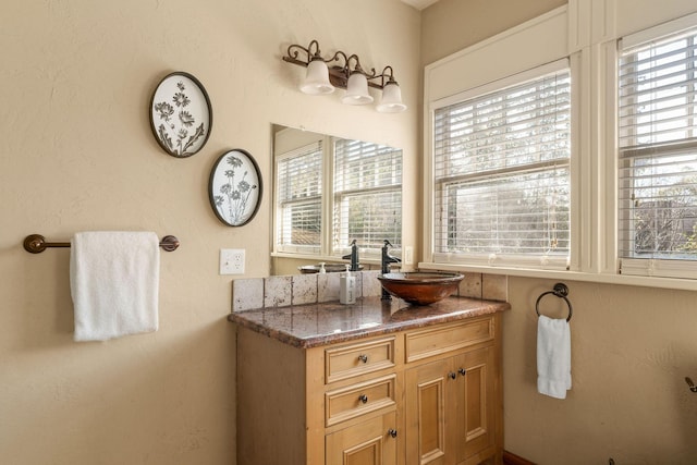 120 N 4th St, Branson, MO 65616 - bathroom featuring plenty of natural light and vanity