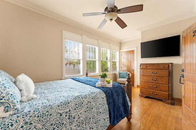 120 N 4th St, Branson, MO 65616 - bedroom with light wood-style floors, ornamental molding, and ceiling fan
