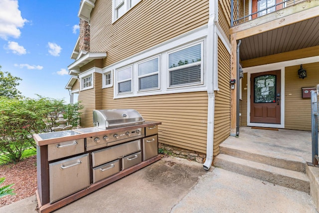 120 N 4th St, Branson, MO 65616 - entrance to property featuring exterior kitchen and a balcony