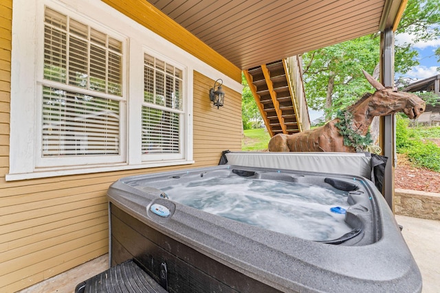 120 N 4th St, Branson, MO 65616 - view of patio / terrace featuring a hot tub