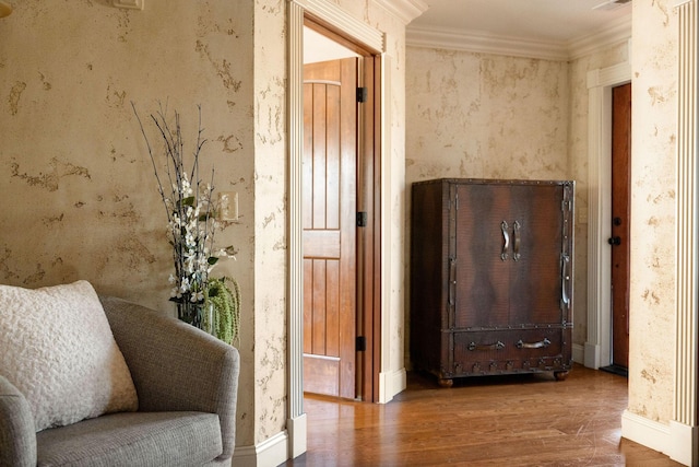 120 N 4th St, Branson, MO 65616 - sitting room with wood finished floors and crown molding