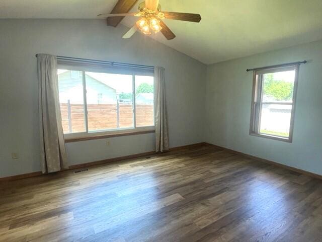 607 Robin Rd, Mountain Grove, MO 65711 - unfurnished room with plenty of natural light, wood finished floors, and a ceiling fan