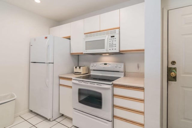 120 Spring Creek Ct Unit B1-U19, Branson, MO 65616 - kitchen featuring white appliances, light countertops, light tile patterned floors, white cabinets, and recessed lighting