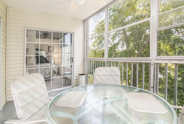 120 Spring Creek Ct Unit B1-U19, Branson, MO 65616 - sunroom featuring outdoor dining space and ceiling fan