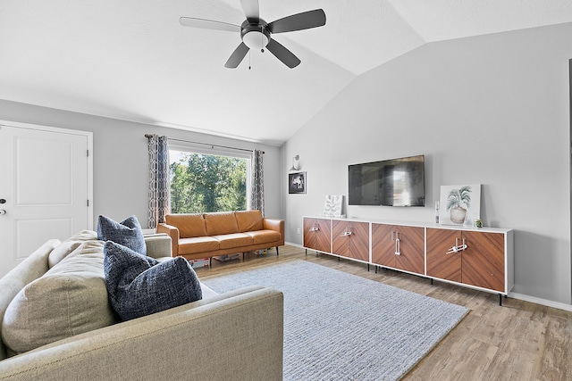 3891 N Spring Branch Ave, Springfield, MO 65803 - living room featuring vaulted ceiling, light wood-type flooring, and a ceiling fan