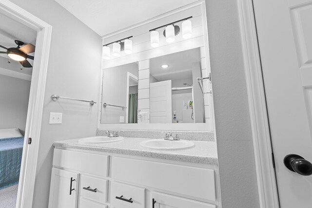 3891 N Spring Branch Ave, Springfield, MO 65803 - ensuite bathroom featuring double vanity, a ceiling fan, and a shower