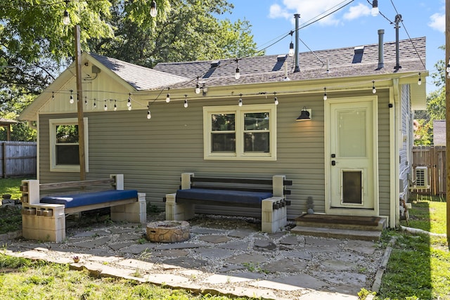 2019 N Rogers Ave, Springfield, MO 65803 - rear view of property featuring roof with shingles and entry steps