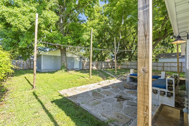 2019 N Rogers Ave, Springfield, MO 65803 - fenced backyard with a patio area