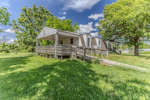 30274 State Highway Bb, Lebanon, MO 65536 - view of front of home with a front yard, a wooden deck, and a gambrel roof