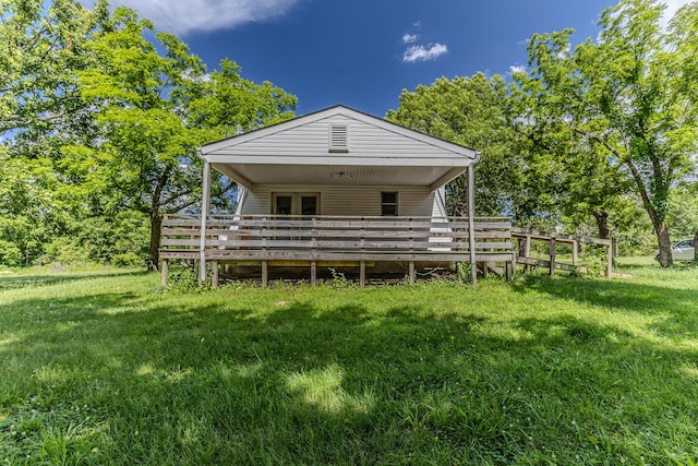 30274 State Highway Bb, Lebanon, MO 65536 - back of house featuring a deck and a lawn