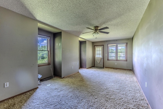 30274 State Highway Bb, Lebanon, MO 65536 - unfurnished bedroom with carpet, a textured ceiling, and ceiling fan