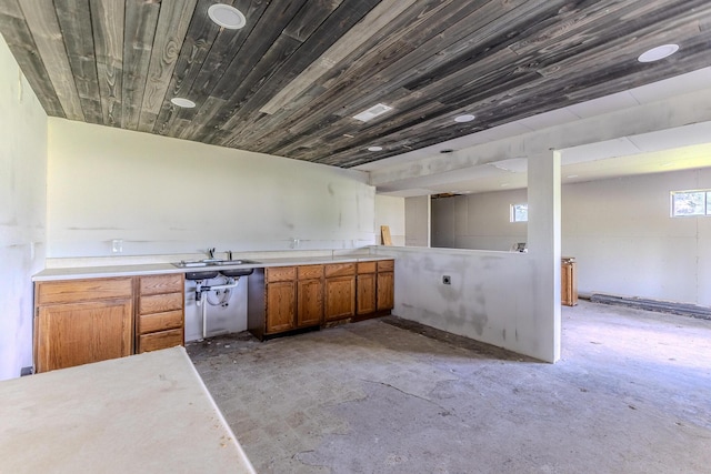 30274 State Highway Bb, Lebanon, MO 65536 - kitchen with concrete flooring, brown cabinets, and light countertops