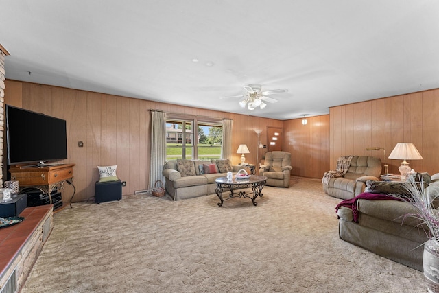 25720 Hillcrest Dr, Shell Knob, MO 65747 - living area with carpet, a ceiling fan, and wooden walls