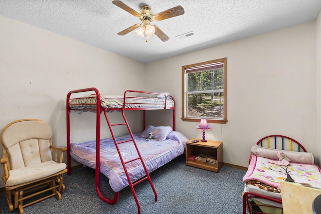 310 Turtle Cove Ln, Reeds Spring, MO 65737 - carpeted bedroom featuring a textured ceiling and a ceiling fan