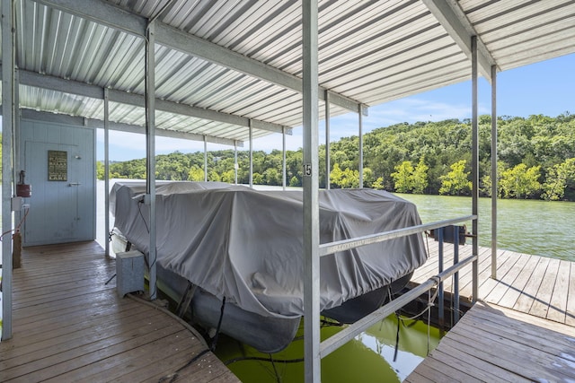 310 Turtle Cove Ln, Reeds Spring, MO 65737 - dock area with boat lift, a water view, and view of scattered trees