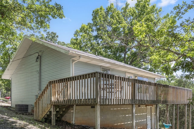 310 Turtle Cove Ln, Reeds Spring, MO 65737 - view of side of home featuring a deck and a central air condition unit