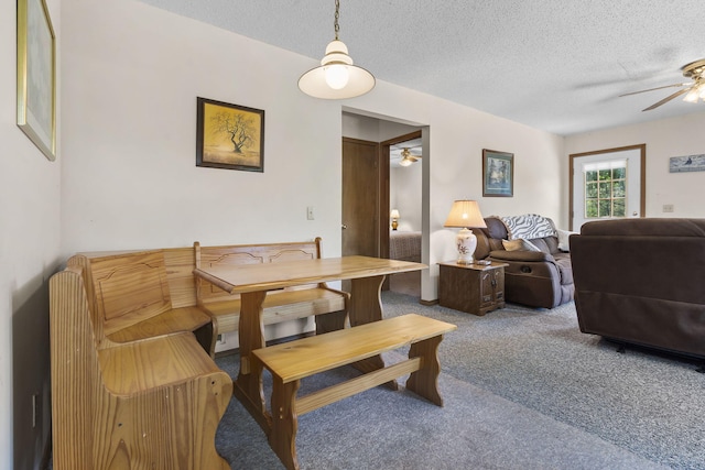 310 Turtle Cove Ln, Reeds Spring, MO 65737 - dining room with ceiling fan, carpet flooring, and a textured ceiling